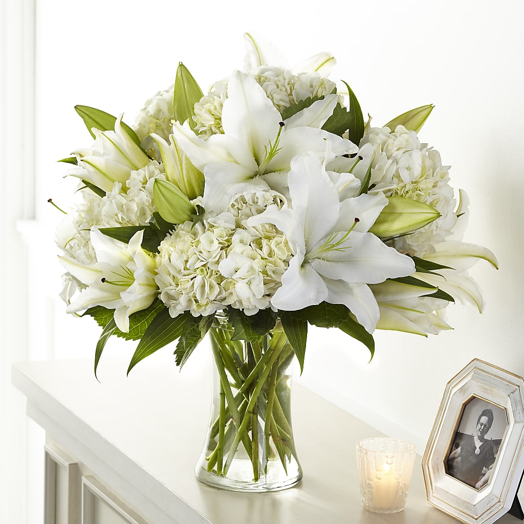 lilies flower arrangements Compassionate Lily Bouquet